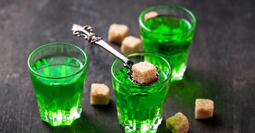 glasses of absinthe with sugar cubes